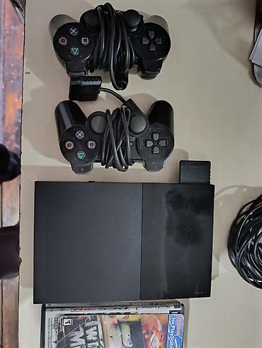 switch 2: Sony PlayStation 2 Slim komplekti Məzmun: - PlayStation 2 Slim — 4