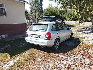 авто салон: Mazda 323: 2002 г., 1.6 л, Механика, Бензин, Универсал — 4