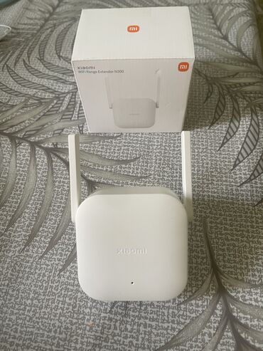 Modemlər və şəbəkə avadanlıqları: Xiomi Wifi Range Extender N300 . Hediyye olaraq verilmişdir istifade