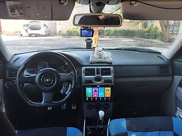 niva tekeri satilir: Lada Priora hatchback – ağ rəng, kondisionerli. Xüsusiyyətlər və — 1