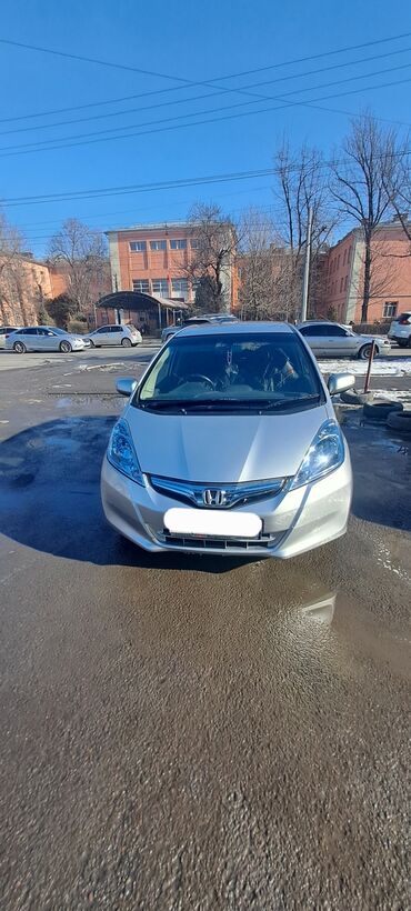 продаю авто номер: Honda Fit: 2011 г., 1.4 л, Вариатор, Гибрид, Хэтчбэк