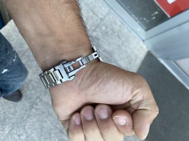 Paslanmayan poladdan hazırlanmış bu metal saat kəməri qalpağı