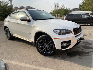 антена на авто: BMW X6, белый купе-кроссовер Основные особенности: - Полный привод