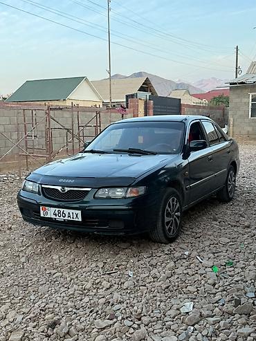 ф 10: Mazda 626: 1999 г., 1.8 л, Механика, Бензин, Седан — 1