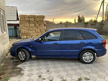 мазда фк: Mazda 323: 2003 г., 1.3 л, Механика, Бензин, Хэтчбэк — 5