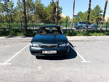 385 55: Mazda 626: 1997 г., 1.8 л, Механика, Бензин, Седан — 2