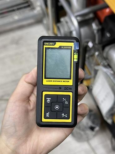 Измерительные инструменты и детекторы: Лазерный дальномер Deli DL331040B - Дальность измерения: до 50 м — 1