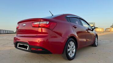 Kia: Kia Pride: 1.4 l | 2013 il Sedan — 7