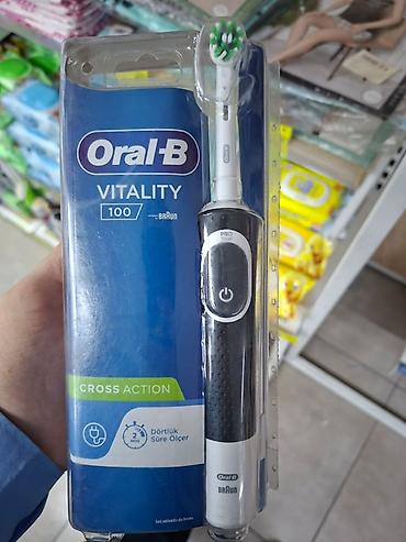 canon eos 5d mark 4: Oral-B Vitality 100 Cross Action elektrik diş fırçası – Braun — 1