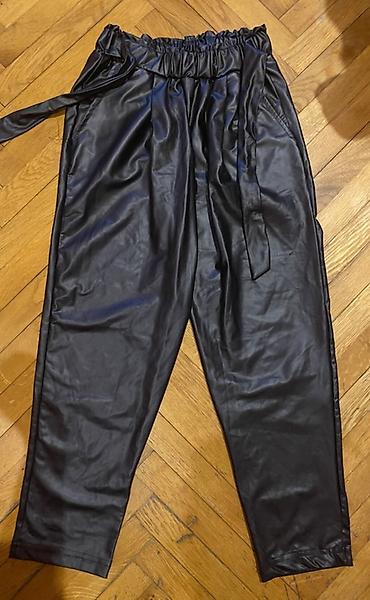 şalvar modelleri 2022: Qara eko‑dəri şalvar/leggins - Material: yumşaq, parıltılı eko‑dəri — 2
