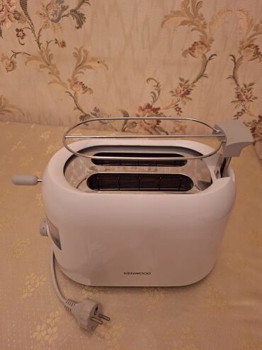 Устройства для борьбы с вредителями: Toster Kenwood ağ rəngdə