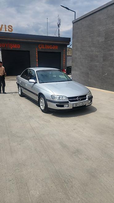 Opel: Opel Omega B sedan - Kuzov: 4 qapılı sedan, gümüş rəng - Mühərrik — 2