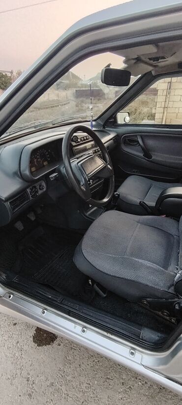 VAZ (LADA): Avtomobil: Lada Samara (VAZ 2114/2115 seriyası – ön görünüş və loqo — 12