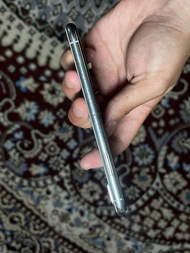 Apple iPhone: IPhone X, Б/у, 64 ГБ, Серебристый, Чехол, 73 % — 10