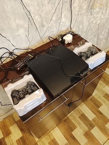 bakcell modem satilir: Sony PlayStation 3 (PS3) Slim oyun konsolu Xüsusiyyətlər və komplekt — 1