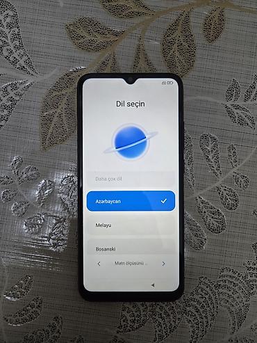 10a: Redmi 10A, 32 GB, rəng - Qara, Barmaq izi — 2