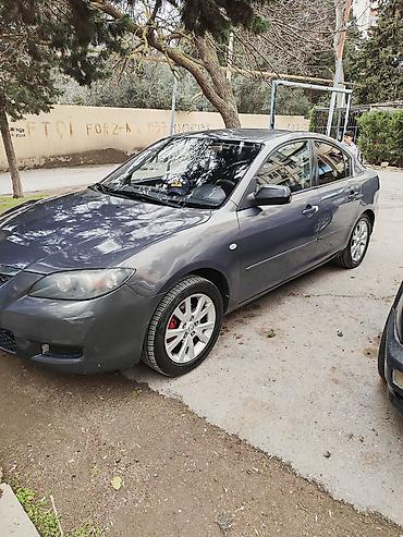 Mazda: Mazda 3 sedan - Kuzov: sedan, tünd-boz rəng - Mühərrik: benzin (detal — 1