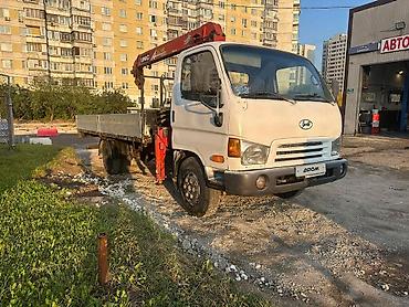 Биз машина чогултуп беребиз кран менен Грузовик Hyundai с бортовой