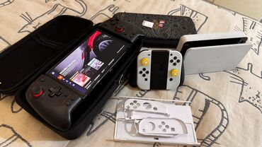 купить нинтендо свитч олед: Чипованная(прошитая) Nintendo Switch OLED (белая) — полный комплект с