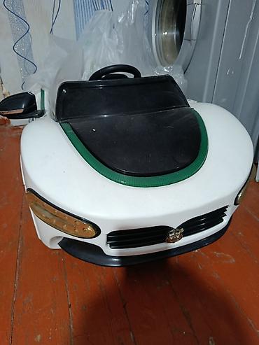 Uşaq dünyası: Uşaq elektromobili – kabriolet dizayn - Rəng: ağ/qara detallarla — 1