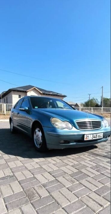 вито машина: Автомобиль Mercedes-Benz C-класса, седан в голубом цвете. Модель