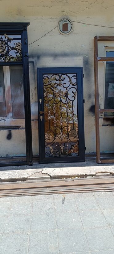 Giriş qapıları: Məhsul: Dəmir giriş qapıları və metal-konstruksiya işləri - Material — 2