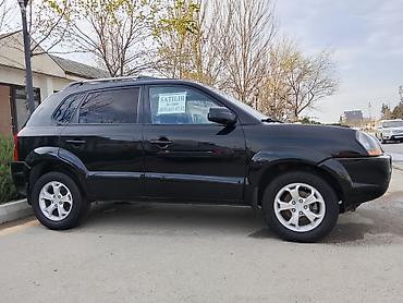 ручка фольксваген: Hyundai Tucson: 2 л | 2008 г. Кроссовер — 3