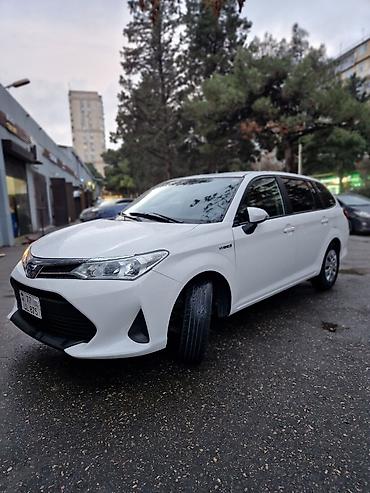 Toyota: Toyota Corolla Fielder Hybrid (ağ rəng, universal kuzov) BUTUN — 1