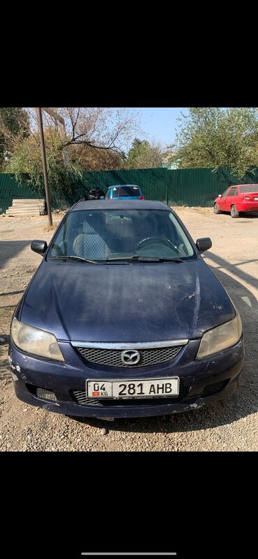 продаю в связи с переездом: Mazda 323: 2001 г., 1.3 л, Механика, Бензин, Хэтчбэк
