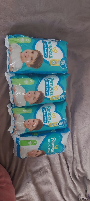 pampers 1 nomre: 1 ededi 7 azn,6 nomredi maqazinde 9 azndi