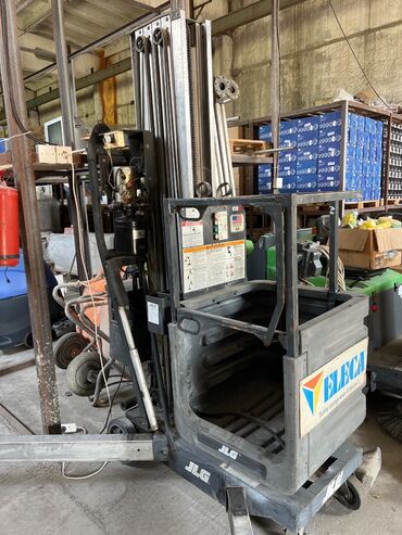 yuk qaldıran kran: JLG AM-30 İnsan qaldıran kran satılır. 9.14 metr platforma uzunluğu