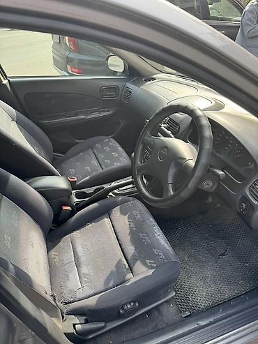 w211 5: Nissan Wingroad: 2000 г., 1.5 л, Автомат, Бензин, Универсал — 4