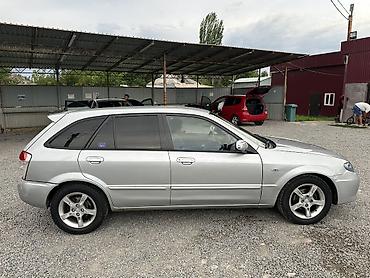 пороги демио: Mazda 323: 2001 г., 1.6 л, Механика, Бензин, Хэтчбэк — 4