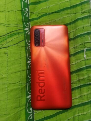 Redmi 9T, 64 ГБ, цвет - Оранжевый, Кнопочный