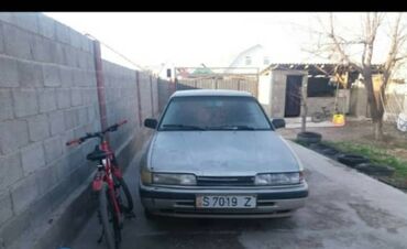 автомобиль митсубиси: Mazda 626: 1992 г., 2 л, Механика, Бензин, Седан