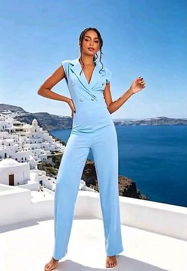 afro perike: Elegantni ženski kombinezon bez rukava - Model sa preklopljenim — 1