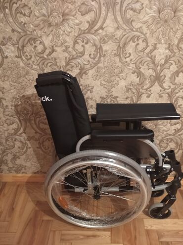 Инвалидные коляски: Əlil arabasi yenidir