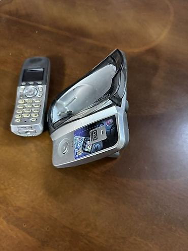 кнопкалы телефонлар: Panasonic KX-TG2050MLS simsiz ev/ofis telefonu və baza stansiyası - — 3