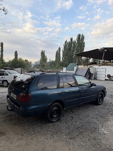 Унаа сатуу: Nissan Primera: 1997 г., 2 л, Кол менен иштөөчү, Бензин, Универсал — 4