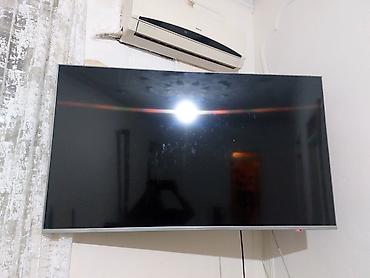 TV və video: - Divar asma tipli böyük ekran televizor - Təkcə panel göstərilir; — 1