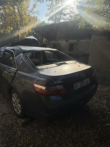 audi c4: Toyota Camry (XV40), седан, комплектация LE, темно-серый цвет — 2