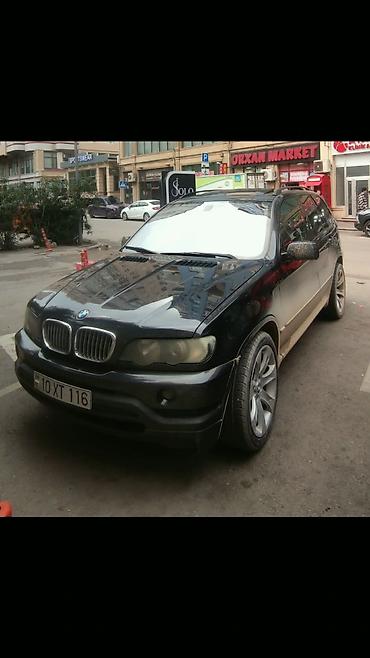 niva 4 qapili: BMW X5 (E53) – qara eksteryer, qırmızı dəri salon - Kuzov: SUV, qara — 9