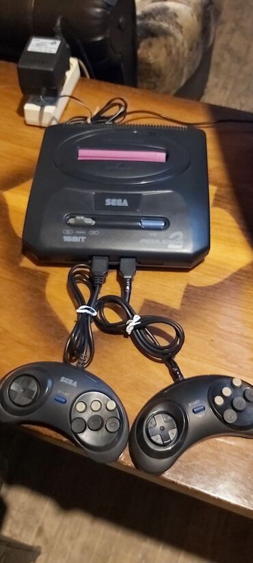 Video oyunlar üçün aksesuarlar: Sega mega drive 2 əla işləyir yaddaşında oyunlar var . Real alıcı