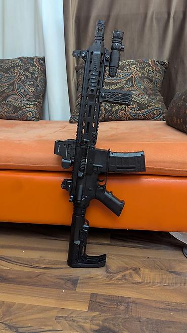 миша: Продам орбизный автомат AR-15 с цевьем SLR. Есть два магазина, два — 1