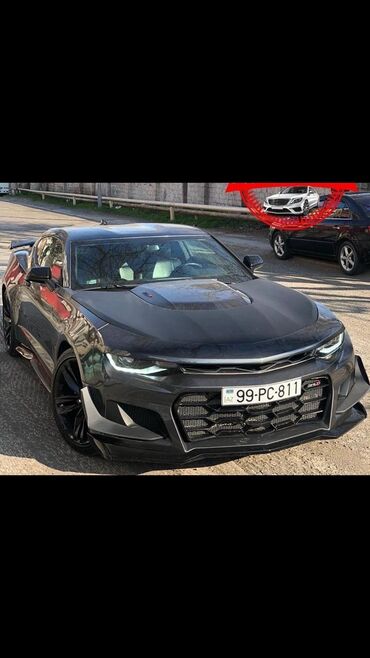 Ford: Model: Ford Mustang GT, kupe, 2 qapı Rəng: Tünd boz (metallic) Nömrə — 8