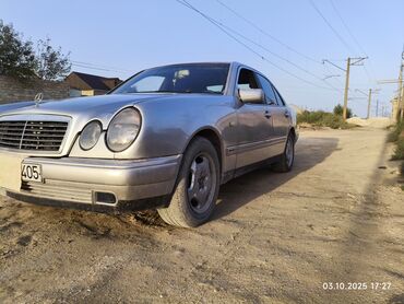 Mercedes-Benz: Mercedes-Benz E-Class: 2.3 l | 1995 il Sedan — 4