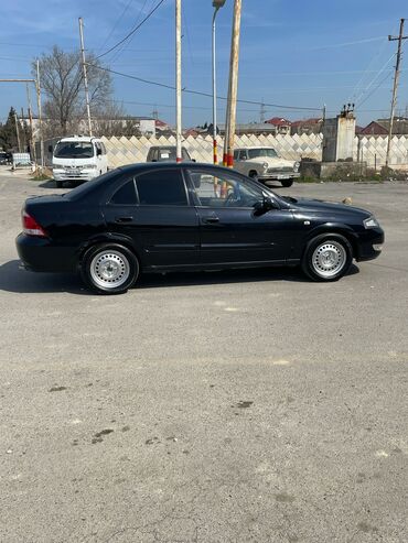 afdamabilər: Nissan Sunny: 1.6 l | 2008 il Sedan