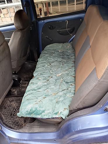 chevrolet lachetti: Компактный городской хэтчбек синего цвета. Кузов: - 5 дверей, задний — 4