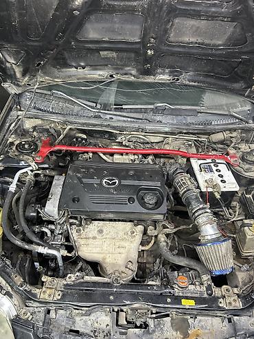 грузовик форд: Mazda 323: 2000 г., Механика, Бензин, Универсал — 5