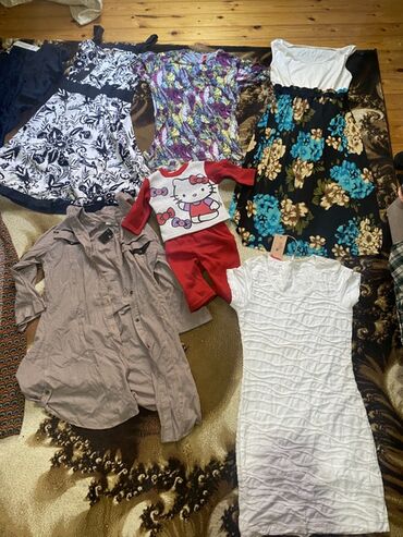 Digər qadın geyimləri: 100 yaxındı hamısın götürene 1 manatdan tek-tek 1.50 — 12